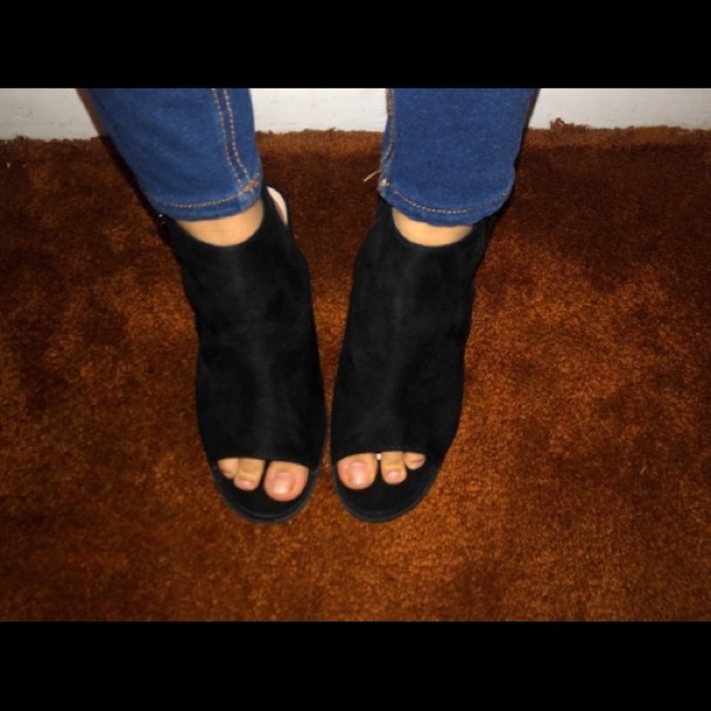 Black ankle boots with straps